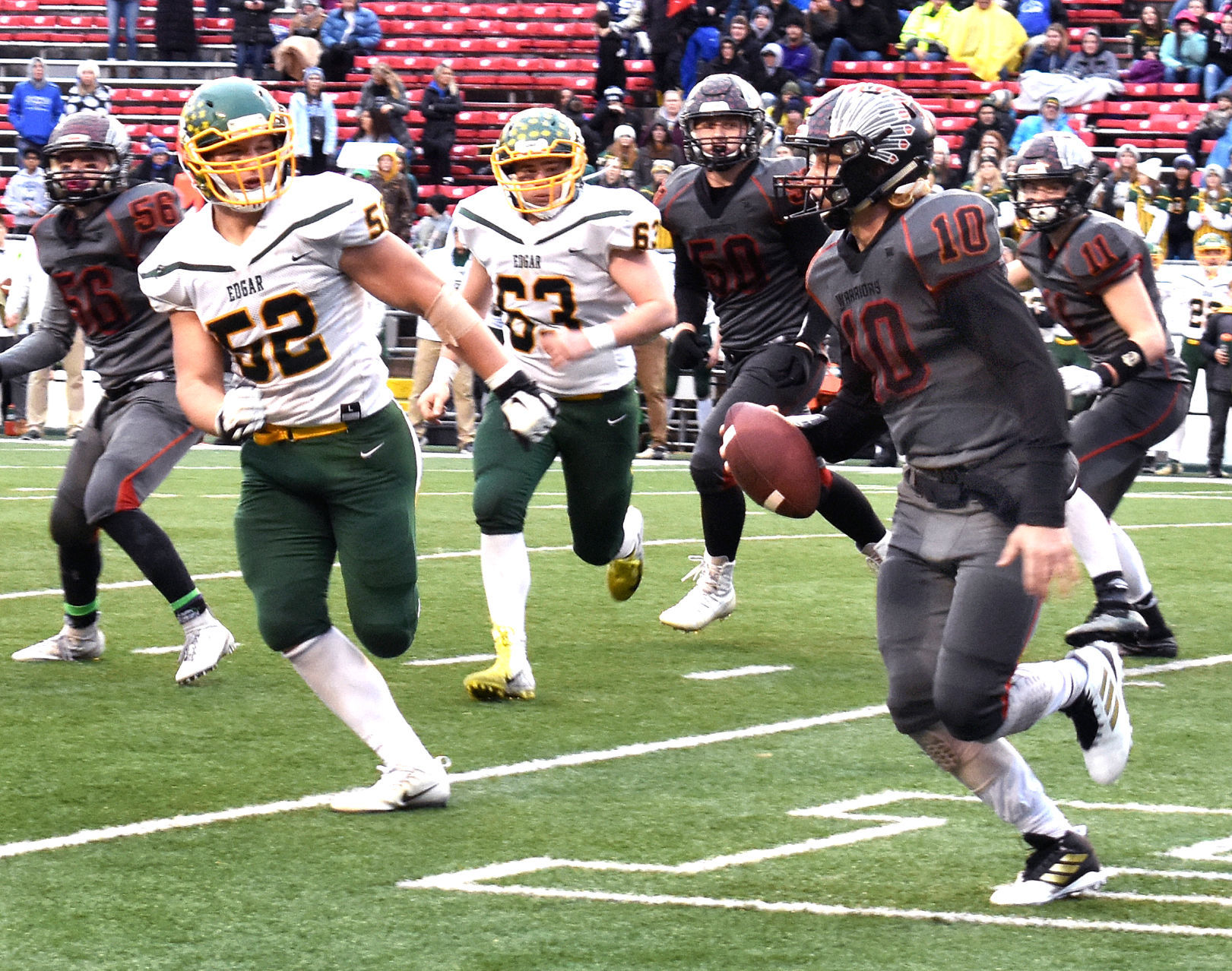 WIAA state football finals photo: Black Hawk QB Ethan Williams looks for a receiver